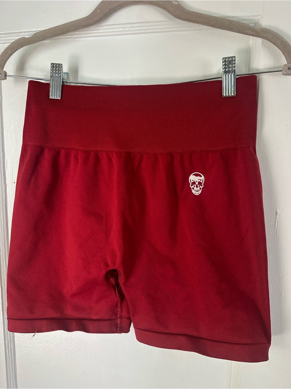 Gymreapers women’s High-Waist Red Bike Shorts with Subtle Skull Detail